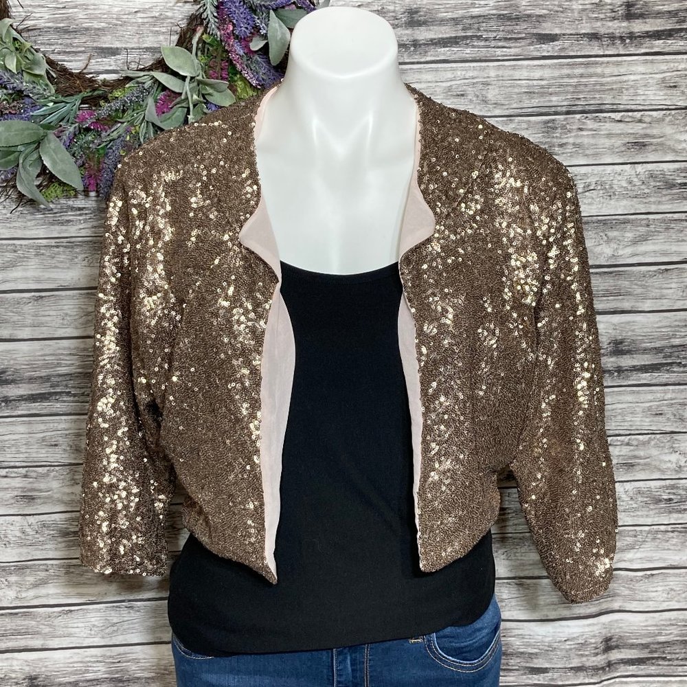 Stitch Knot by Anthro Star Shine Bolero Rose Gold